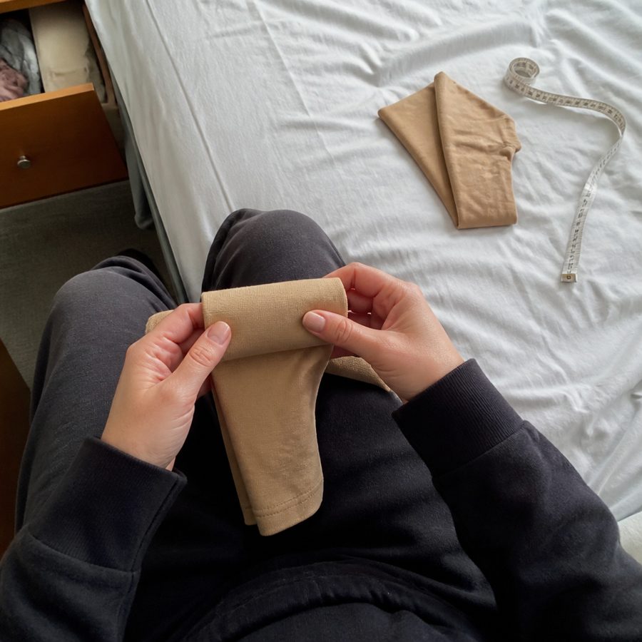 Rolling up a compression stocking